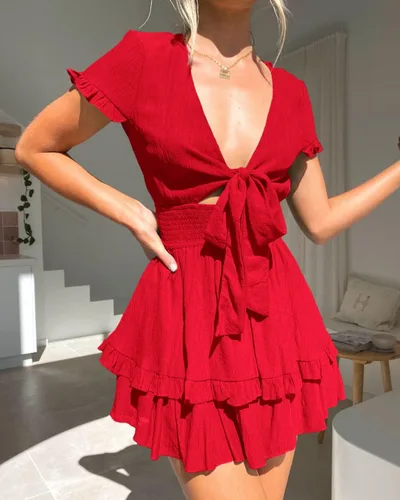 Vista 3 de PRETTYGARDEN - Mini vestido de verano con vuelo para mujer. Vestido corto acampanado con cuello en V y manga corta con volantes en la parte delantera