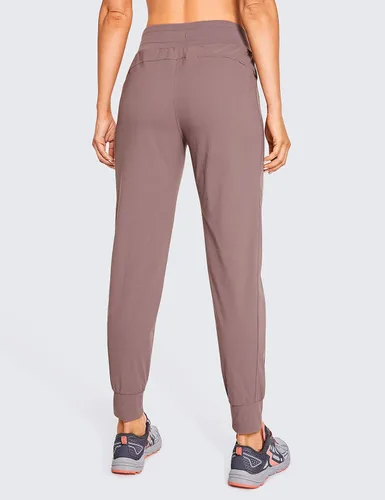 Vista 2 de CRZ YOGA Pantalones deportivos de cintura alta con bolsillos para mujer, de 27.5 pulgadas, ligeros, para entrenamiento, viajes, uso casual, al aire