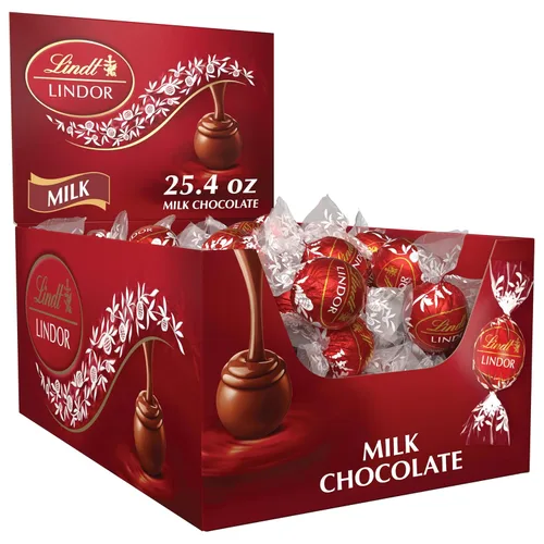 Vista 15 de Lindt LINDOR Caja de Regalo Tradiciones de Trufas de Chocolate con Leche, Caramelo de Chocolate con Leche con Centro de Trufa Suave y Derretido, 6.8