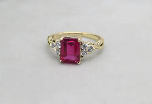 Vista 4 de Dazzlingrock Collection 8x6mm Emerald Shape Center Lab Created Ruby & 2.2mm Round White Sapphire on Side Crisscross Shank Engagement Ring for Her in