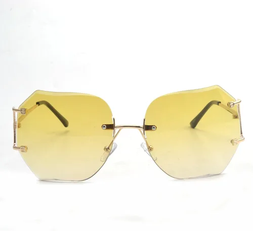 Vista 5 de lentes de sol sin montura de tamaño grande con lentes transparentes para mujer.