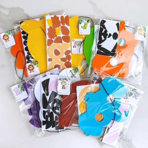 Vista 3 de Winlyn 27 juegos de máscaras de animales de la selva, kits de manualidades, máscaras faciales de animales de safari, máscaras de espuma para fiestas