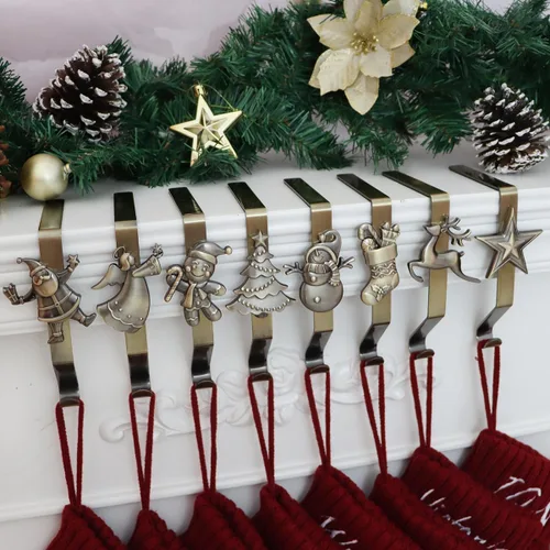 Vista 18 de Juego de 4 soportes de calcetines de Navidad para manto, ganchos reutilizables para calcetines de Navidad, colgador de Navidad sin daños