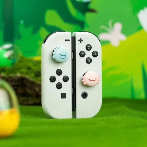 Vista 5 de GeekShare Bonitas tapas de silicona para el pulgar, funda de joystick compatible con Nintendo SwitchOLEDSwitch Lite, 4 unidades, dinosaurio y ajolote