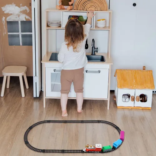 Vista 8 de Juego de tren eléctrico navideño para pista de ferrocarril de plástico y maleta portátil, superficie lisa segura para niños y colores brillantes que