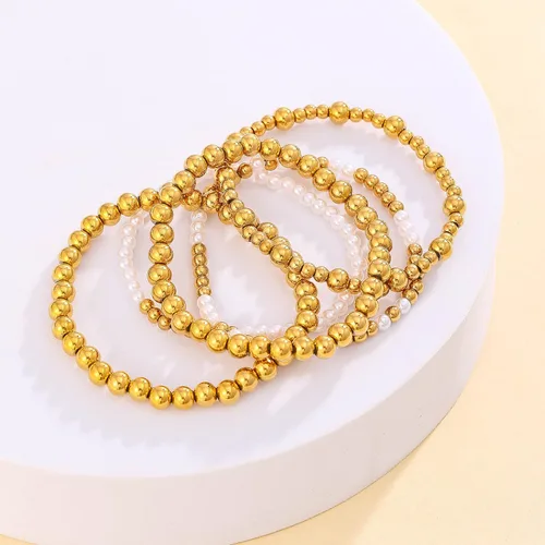 Vista 4 de KIWISE Pulseras de cuentas de oro para mujer, chapado en oro de 18 quilates, apilables, elásticas, juego de pulseras de bolas de cuentas, regalos