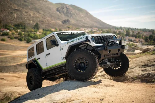 Vista 2 de DV8 Offroad Armor Fender Flares para Jeep Wrangler JL 2018-2026 Ancho estrecho Diseño de acero chapado en blindaje rígido (2) señales de giro