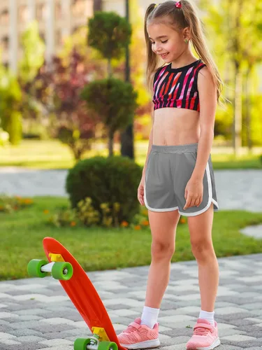 Vista 6 de Poroka Paquete de 3 pantalones cortos de correr para niñas, pantalones cortos deportivos de delfín con bolsillos, de secado rápido, pantalones