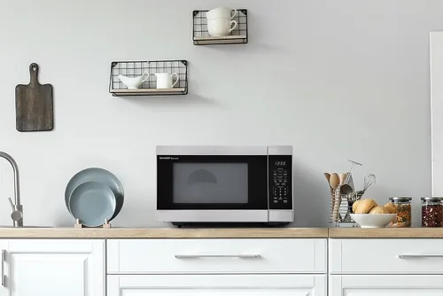 Vista 7 de SHARP Horno microondas para encimera con plato giratorio extraíble de 13.6 pulgadas, 1100 vatios, 1.6 pies cúbicos, acero inoxidable Tocadiscos