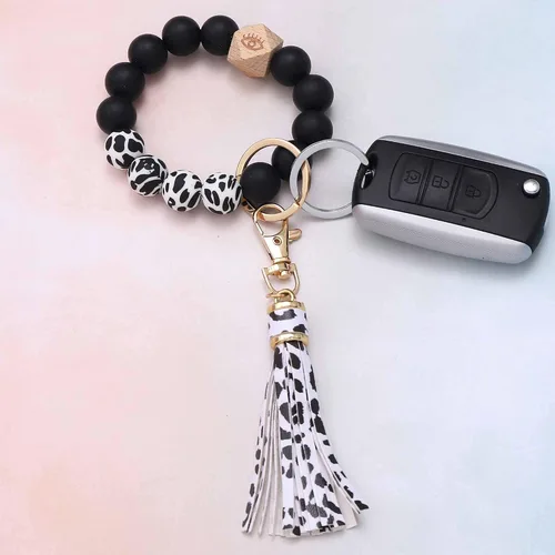 Vista 3 de BAOSIWA Pulsera de cuentas de silicona con llavero de pulsera para mujer con borla de cuero
