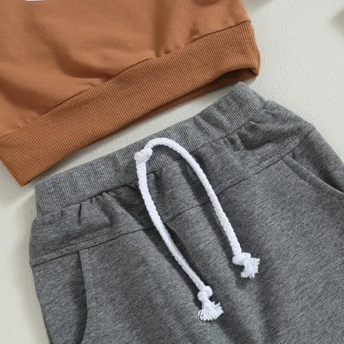 Vista 4 de Hnyenmcko Conjunto de camiseta de manga larga con cuello redondo a rayas y pantalones sólidos con cordón ajustable