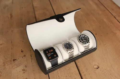 Vista 7 de Case Elegance - Caja de viaje de cuero vegano para reloj, Negro