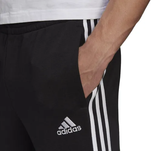 Vista 3 de adidas Pantalones Essentials de rizo francés con puños cónicos de 3 rayas para hombre