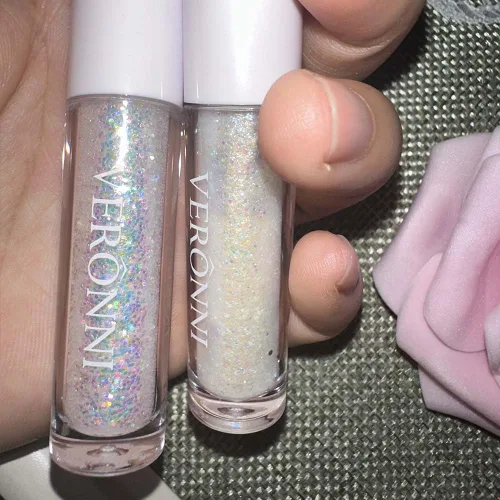 Vista 6 de Juego de maquillaje de lentejuelas líquidas en gel holográfico y delineador de ojos plateado, 2 piezas, resaltador líquido brillante, resistente al