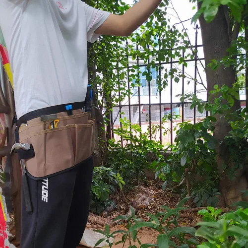 Vista 6 de Delantal de cintura para herramientas de jardín, delantal profesional de trabajo de cintura resistente con 13 bolsillos, delantales de jardinería