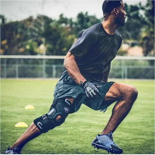 Vista 4 de DonJoy Performance Bionic rodillera de ACL de cierre completo - 4 puntos de apoyo con bisagras articuladas para protección de ligamentos, lesiones