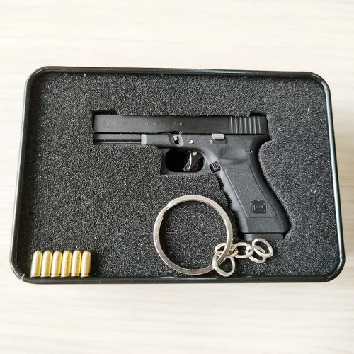 Vista 5 de Mini llavero de pistola, llavero con forma de pistola, llavero táctico pequeño con forma de pistola, regalo con colgante en forma de armas, llaveros