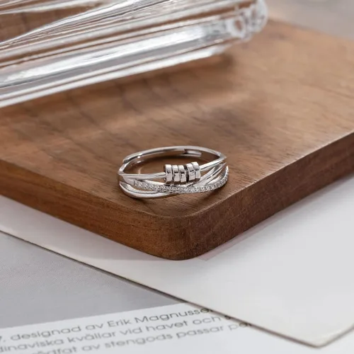 Vista 4 de PABBEU Anillo de ansiedad para mujer de plata de ley 925, anillo giratorio con circonita cúbica ajustable, anillo antiestrés para mujer