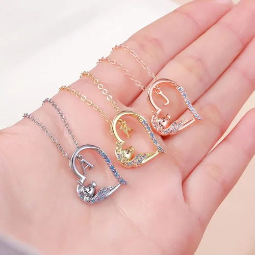 Vista 5 de Anoup Collar con inicial de unicornio, chapado en oro de 14 quilates, hipoalergénico con circonita cúbica, colgante de diamante simulado, joyería