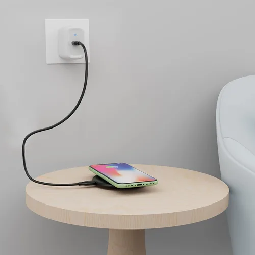 Vista 7 de Amazon Basics Almohadilla de carga inalámbrica certificada Qi de 15 W para iPhone 16/15/14/13/12/11/X, Samsung y más, con cable USB, negro