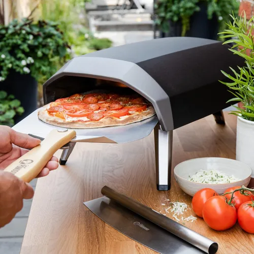 Vista 8 de Pomodoro pala para pizza de aluminio con asa de madera plegable para guardar fácilmente, de 12" x 14", para cocinar pan y pizzas en el hogar