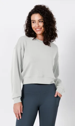 Vista 4 de ODODOS Sudaderas cortas de manga larga suaves de modal para mujer, de gran tamaño, cuello redondo