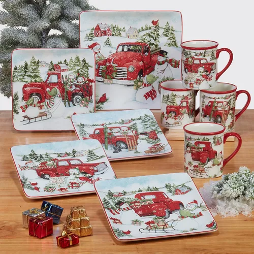 Vista 3 de Juego de 4 platos llanos de cerámica con diseño de muñeco de nieve de camión rojo. Añade encanto clásico de vacaciones a tu mesa con estos platos