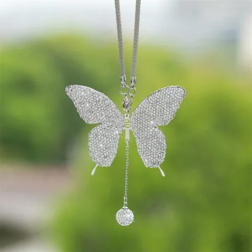 Vista 7 de MiOYOOW Adorno colgante de mariposa para automóvil, accesorio de espejo retrovisor con diamantes de imitación, ajuste universal, adorno colgante