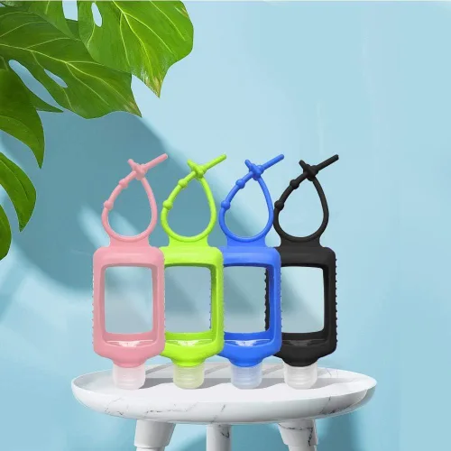 Vista 3 de Paquete de 4 botellas transparentes de plástico de tamaño viaje con funda de silicona rellenables, recipientes vacíos para apretar, a prueba
