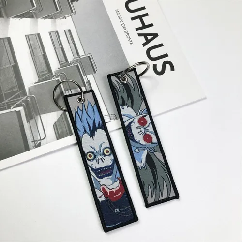 Vista 2 de 1 Pack Anime Etiqueta de Llavero Jet Etiqueta de Llavero Dibujos Animados Bordados con Llavero para Motocicletas Accesorios de Coche