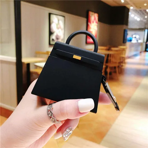 Vista 3 de Compatible con auriculares Airpods 1 y 2, diseño de bolsa de mano de moda, protector de auriculares inalámbricos, silicona suave, accesorios a Negro