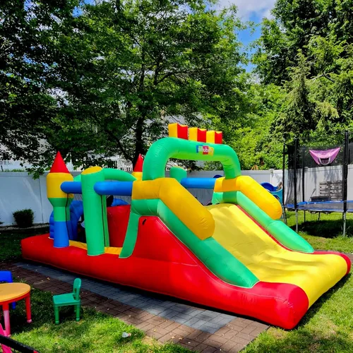 Vista 8 de Whubefy Casa de rebote grande inflable de 18x8.2 pies para niños grandes de 8 a 12 años, casa de obstáculos inflable con doble tobogán, túneles