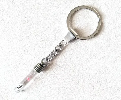 Vista 7 de Customized personalized name on a grain of rice- Necklace, keychain or both with a 2mm stainless steel figaro chain
