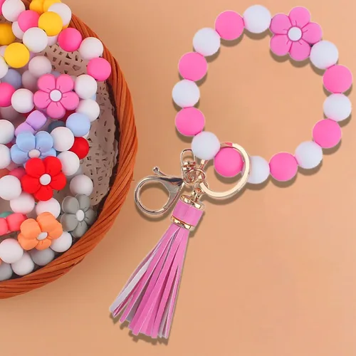Vista 2 de Elegante pulsera de silicona con cuentas para mujer, llavero con clip de oro, soporte multifuncional para llaves