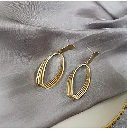 Vista 4 de La Raffine - Aretes ovalados geométricos huecos en color tonto de plata 925, joyería para mujeres y niñas, regalos de San Valentín, cumpleaños