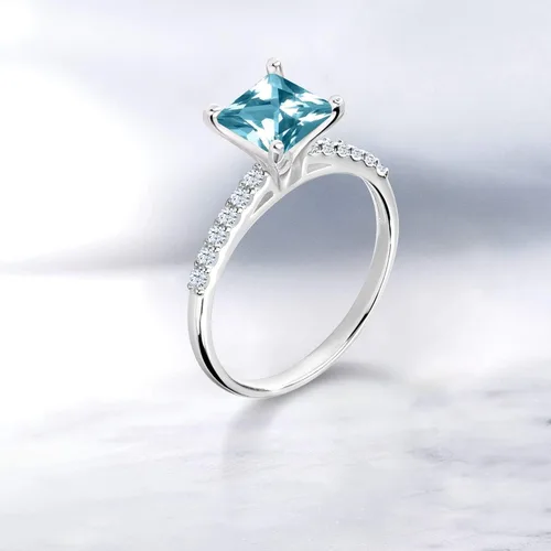 Vista 4 de Gem Stone King Juego de anillos de oro blanco de 10 quilates con topacio azul hielo y zafiro blanco creado