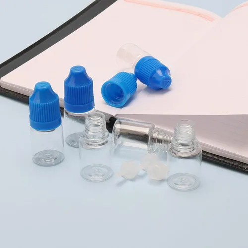 Vista 5 de 10 botellas de gotero transparentes de plástico vacías de 0.2 fl oz E-jugo E-líquido a prueba de niños, tapa azul