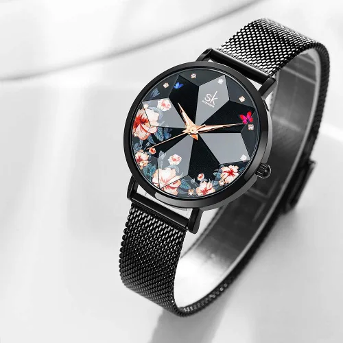 Vista 4 de SK Shengke - Reloj ultra delgado de creativo diseño minimalista floral o de cielo estrellado con extensibles de piel genuina o acero
