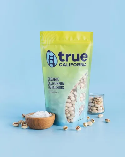 Vista 4 de True California Pistachos orgánicos secos tostados y ligeramente salados marinos (1 libra) en la cáscara - Snacks saludables, veganos y sin gluten