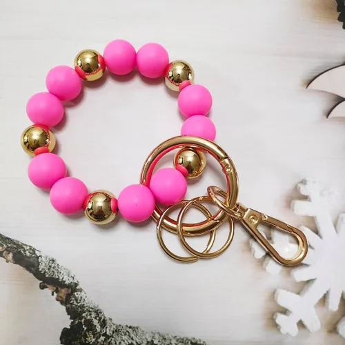 Vista 7 de Junyuerly Llavero de pulsera con cuentas de silicona para mujer, pulsera elástica con clip dorado