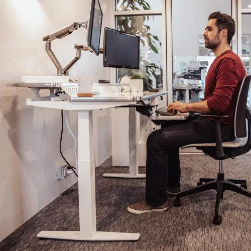 Vista 6 de VERSADESK Escritorio eléctrico de pie de 48 pulgadas, escritorio de pie ajustable en altura de grado comercial, escritorio ergonómico para negro