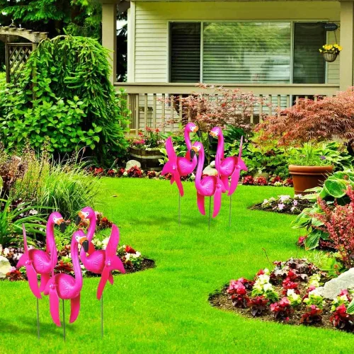 Vista 4 de Fun Express Juego de 6 adornos de mini flamencos rosados para patio, molinillos de viento para exteriores con alas giratorias, regalos de decoración