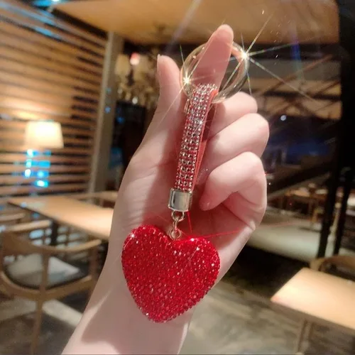 Vista 2 de Llaveros con diamantes de imitación en forma de corazón con purpurina y bolsa de cuero, llavero de cristal brillante para mujeres y niñas