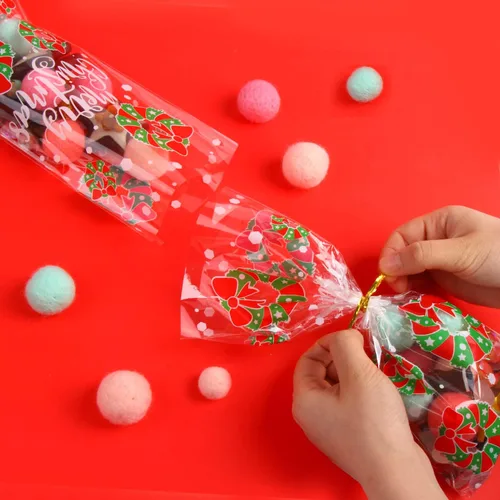 Vista 4 de KIMOBER 144 bolsas de dulces de celofán de Navidad, bolsas de golosinas de celofán con lazos giratorios para suministros de fiesta de Navidad