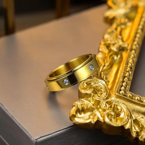 Vista 7 de Kainier Anillos de ansiedad chapados en oro de 14 quilates piedras de circonita cúbica anillos giratorios para mujeres y hombres anillos