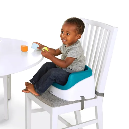 Vista 9 de Asiento elevador SmartClean Toddler Booster de Ingenuity para mesa de comedor con correas de arnés de 3 puntos, azul pavo real