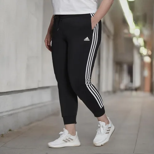 Vista 11 de Adidas Essentials - Pantalones de forro polar con puños cónicos para mujer
