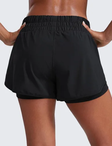 Vista 2 de CRZ YOGA - Pantalones cortos de correr 2 en 1 divididos para mujer de 3 pulgadas - Pantalones cortos de entrenamiento atlético de cintura alta