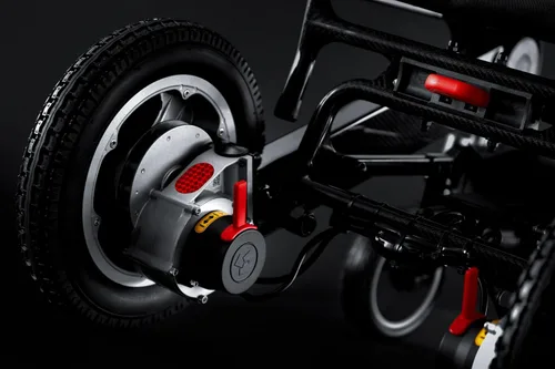 Vista 6 de Porto Mobility Ranger SpacePro XL - Silla de ruedas eléctrica de fibra de carbono ligera y plegable de próxima generación (carbono, asiento ancho XL)