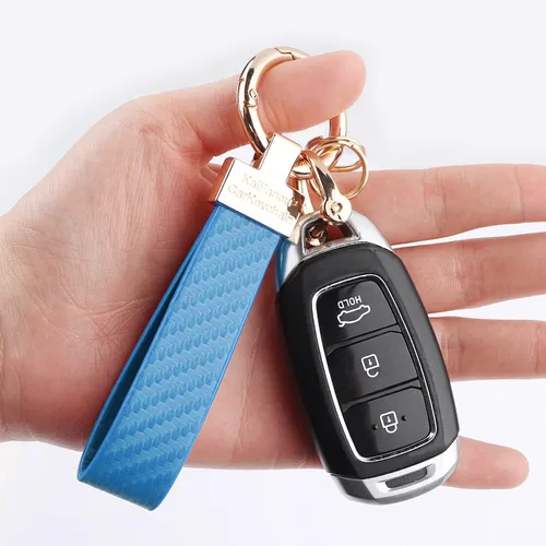 Vista 5 de Turcee Llavero de cuero de lujo con anillo D antipérdida, fibra de carbono brillante personalidad llavero de coche para mujereshombresmochilas